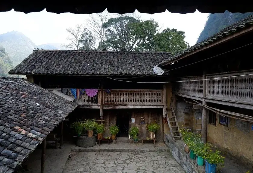 Pao's house was built nearly 100 years ago with moss-covered yin-yang tile roofs